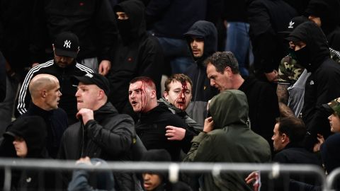 Ajax supporters were left bloodied in clashes before the team's game at AEK Athens in the Champions League. 