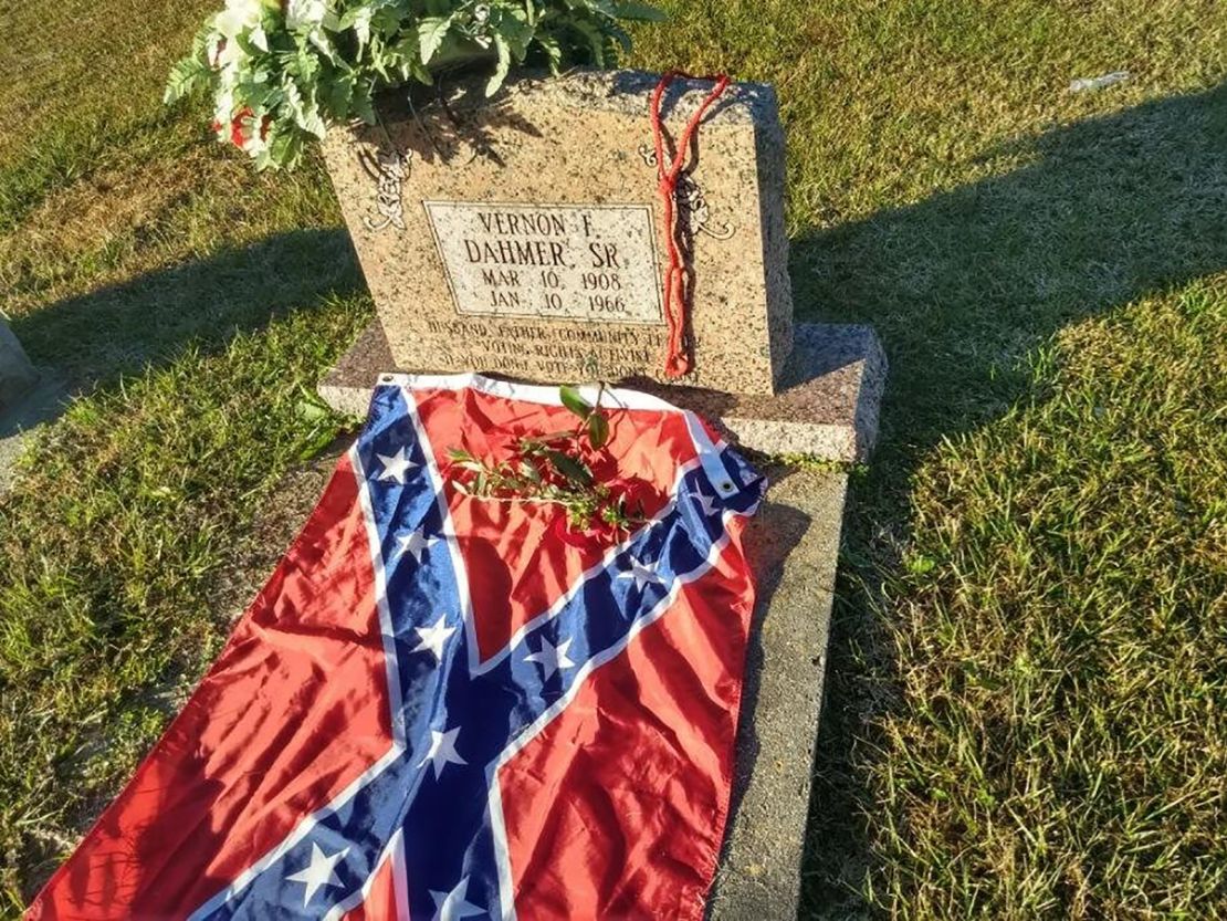 Bivins says she placed the flag on Vernon Dahmer's grave as a gesture of hope for the end of racism.