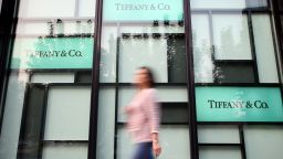 A pedestrian walks past a Tiffany and Co. boutique in Shanghai, China, 15 October 2010.

