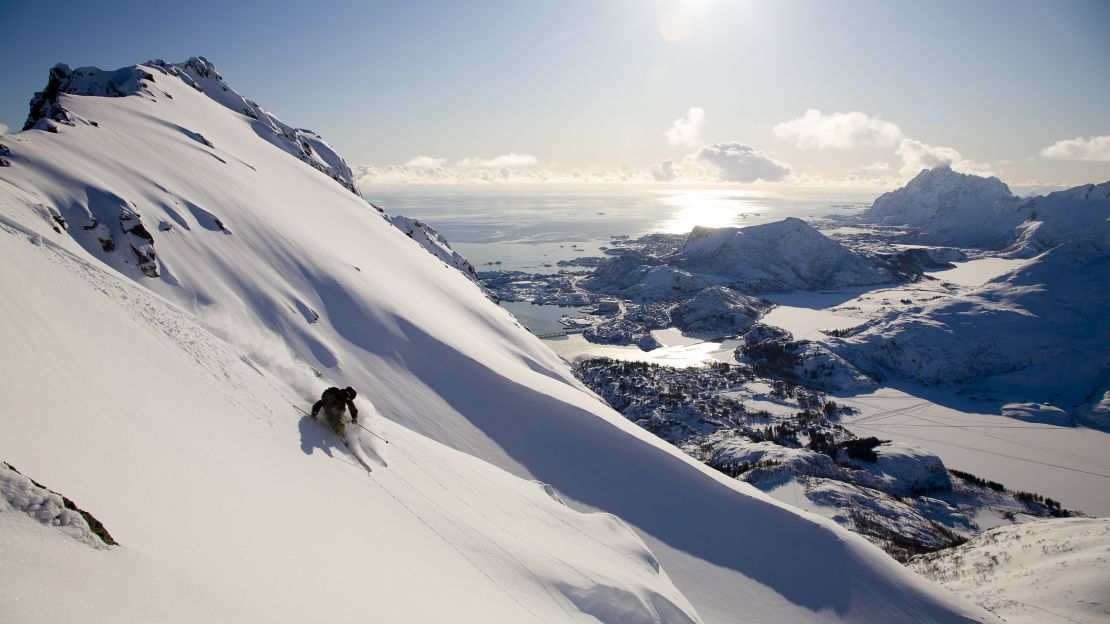 Northern Norway: where jagged peaks rise out of shimmering seas like snow-white shark's teeth