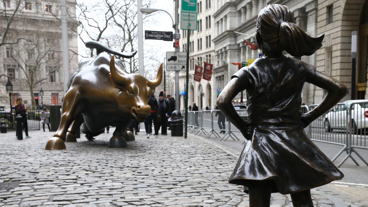 "Fearless Girl" faces "Charging Bull." 