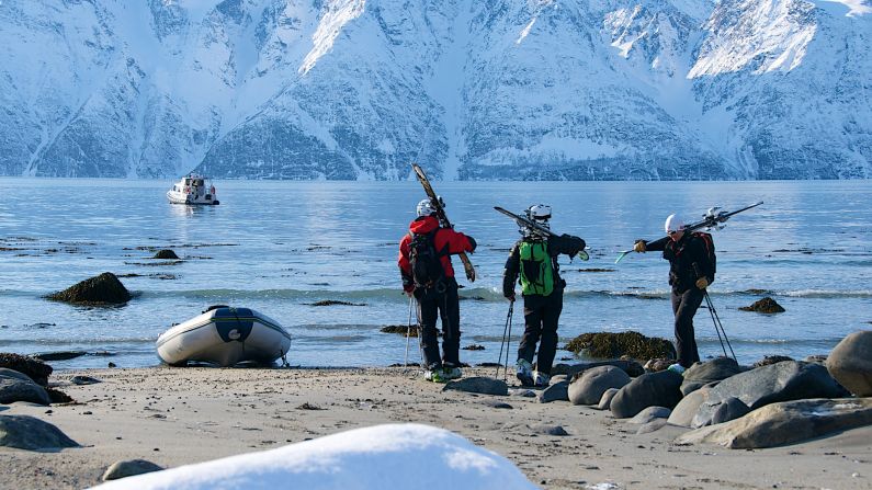 <strong>Spirit of Lyngen: </strong>The lodge's motor launch  drops skiers and their guides on snow-covered beaches to begin ski touring.