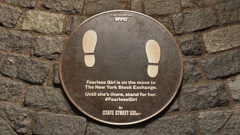 A plaque has been installed where the statue used to be.