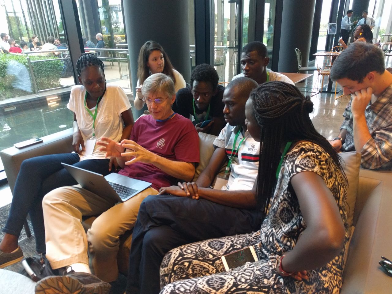 Occultation team member Michael Skrutskie (University of Virginia) is pictured here giving an impromptu lecture on observational astronomy to students from the University of Dakar following an "all hands" occultation team meeting near Dakar, Sénégal. From left are Mame Diarra Dieng, Bridget Anderson, Michael Skrutskie, Modou Mbaye, Abdou Lahat Dieng, Abdoulaye Ba, Salma Sylla Mbaye, and Patrick Edwards.