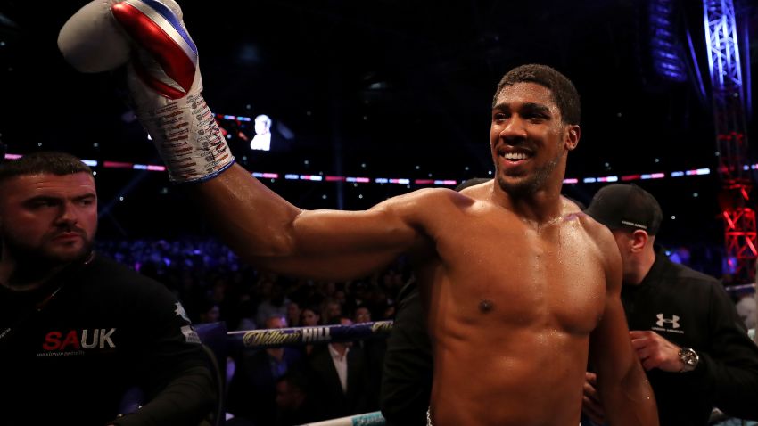 LONDON, ENGLAND - SEPTEMBER 22:  Anthony Joshua celebrates victory after the IBF, WBA Super, WBO & IBO World Heavyweight Championship title fight between Anthony Joshua and Alexander Povetkin at Wembley Stadium on September 22, 2018 in London, England.  (Photo by Richard Heathcote/Getty Images)