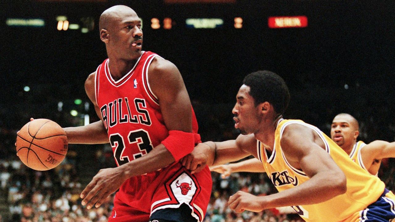 LOS ANGELES, UNITED STATES:  Michael Jordan of the Chicago Bulls (L) eyes the basket as he is guarded by Kobe Bryant of the Los Angeles Lakers during their 01 February game in Los Angeles, CA. Jordan will appear in his 12th NBA All-Star game 08 February while Bryant will make his first All-Star appearance. The Lakers won the game 112-87.  AFP PHOTO/Vince BUCCI (Photo credit should read Vince Bucci/AFP/Getty Images)