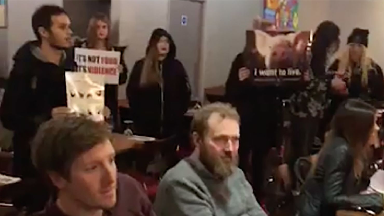Vegan protesters storm steakhouse in Brighton, UK.