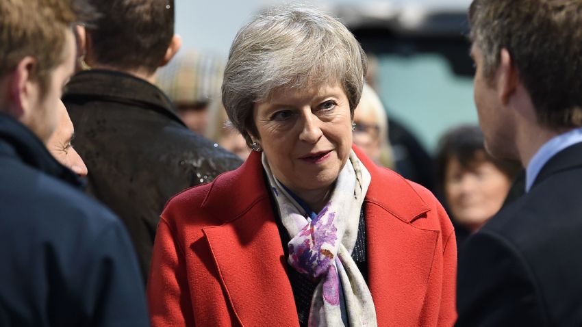Britain's Prime Minister Theresa May (C) meets with agricultural producers and business representatives as she tours the Royal Welsh Winter Fair at the Royal Welsh Showground in Builth Wells, Powys, in Mid Wales, on November 27, 2018. - Britain's Prime Minister Theresa May launched a nationwide tour to whip up support on November 27 for the Brexit deal that has divided Britain. (Photo by Paul ELLIS / various sources / AFP)        (Photo credit should read PAUL ELLIS/AFP/Getty Images)
