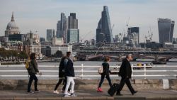Pedestrians waling through Waterloo Bridge with the skyline of the City of London in the background on October 27, 2016. 
Britain's economy won a double boost on October 27 on news of faster-than-expected growth following its vote for Brexit and a pledge by Nissan to build new car models in the UK. Gross domestic product expanded by 0.5 percent in the third quarter, official data showed.
 / AFP / Daniel Leal-Olivas        (Photo credit should read DANIEL LEAL-OLIVAS/AFP/Getty Images)
