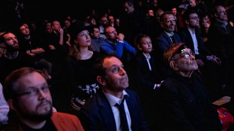 The crowd watch  Fabiano Caruana and Magnus Carlsen take part in the final