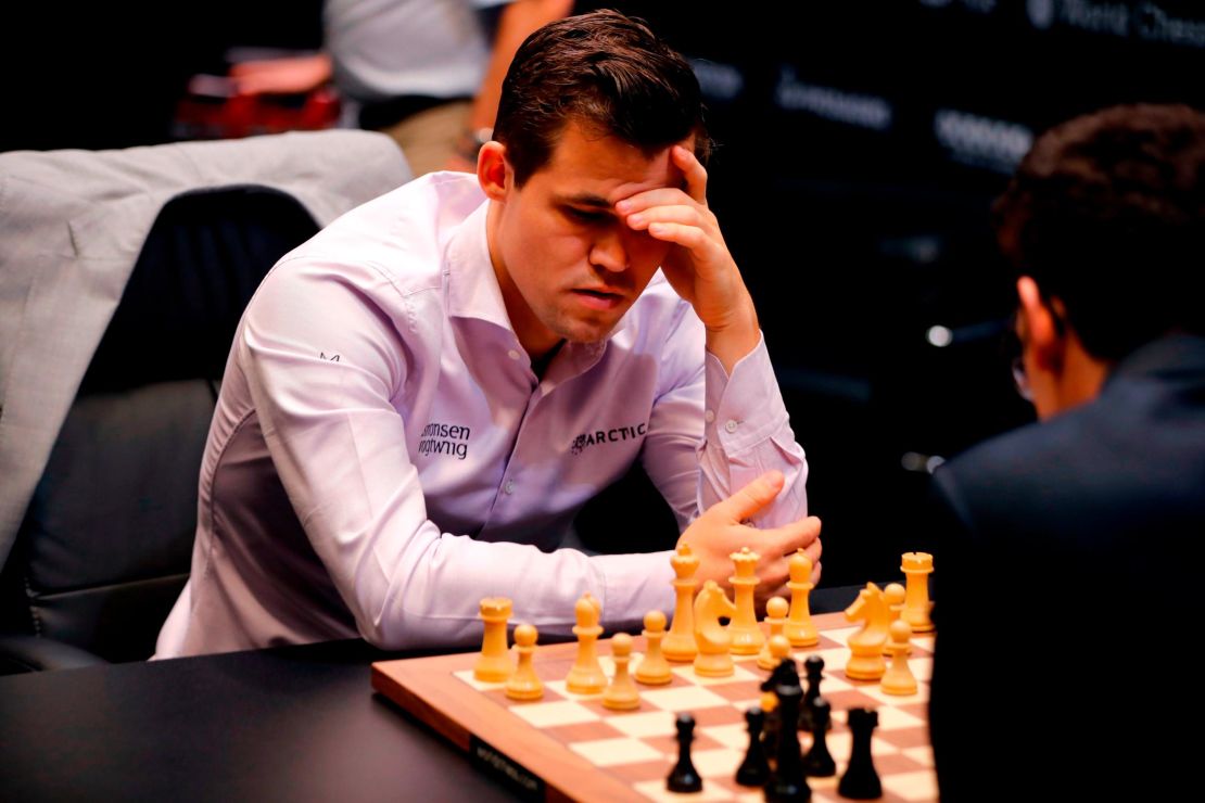 Magnus Carlsen barely saves draw as Fabiano Caruana misses win in