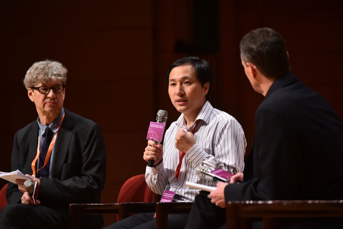 Chinese scientist He Jiankui in a discussion with head of the Laboratory of Stem Cell Biology and Developmental Genetics at the Francis Crick Institute, Robin Lovell-Badge.