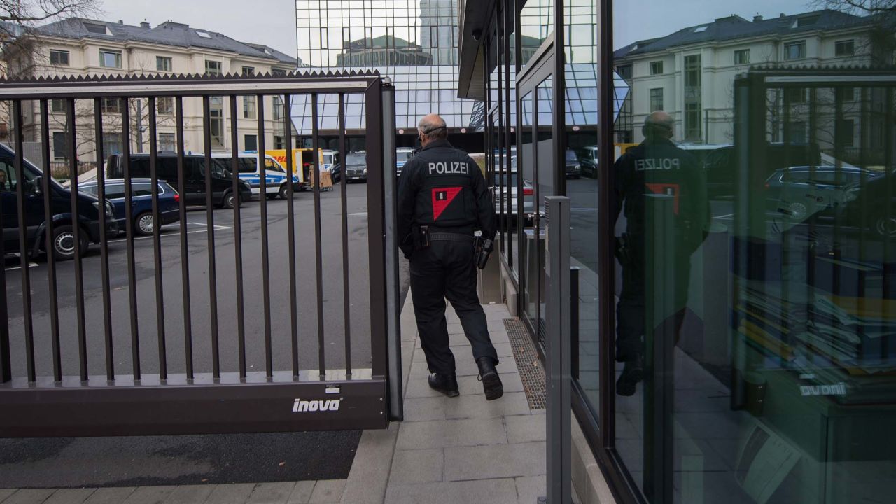 A police officer outside the headquarters of Deutsche Bank in Frankfurt, Germany, on Thursday.