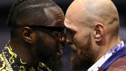 LOS ANGELES, CA - OCTOBER 03:  Professional boxers Deontay Wilder (L) and Tyson Fury butt heads onstage during their press conference to promote their upcoming December 1, 2018 fight in Los Angeles at The Novo by Microsoft on October 3, 2018 in Los Angeles, California.  (Photo by Victor Decolongon/Getty Images)