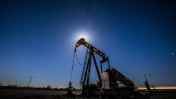 MIDLAND, TX - MAY 5: Workers extracting oil from oil wells in the Permian Basin in Midland, Texas on May 5, 2018. Oil production has been causing a sudden influx of money especially for local Texans despite the consequences to the natural environment. (Photo by Benjamin Lowy/Getty Images)