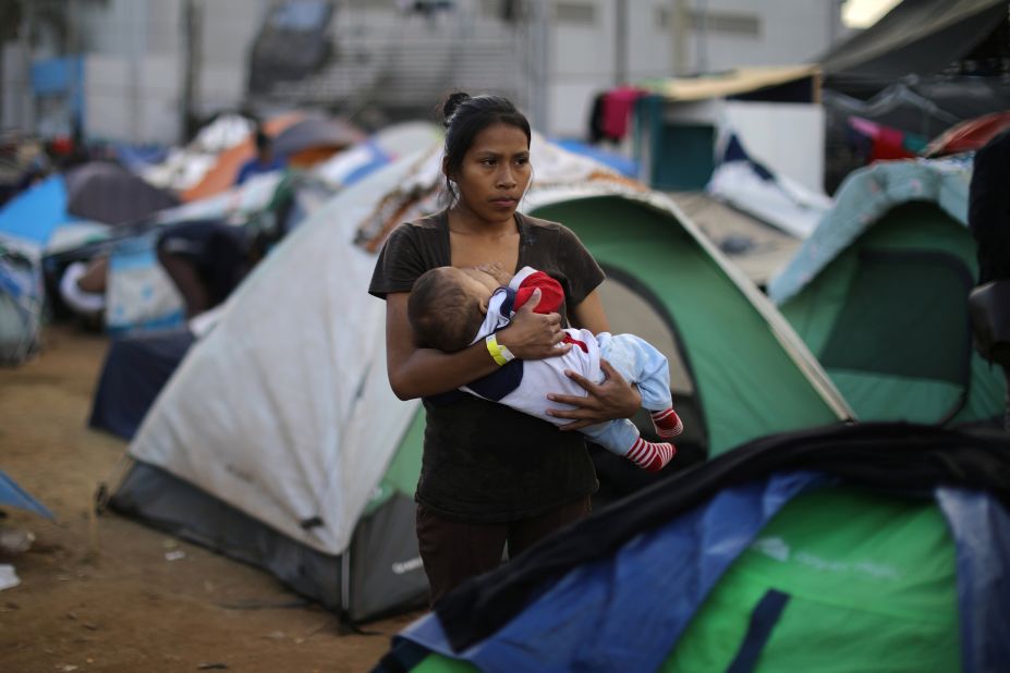 Jessica Perez, an 18-year-old from El Salvador, nurses her 6-month-old son, Giovanni.