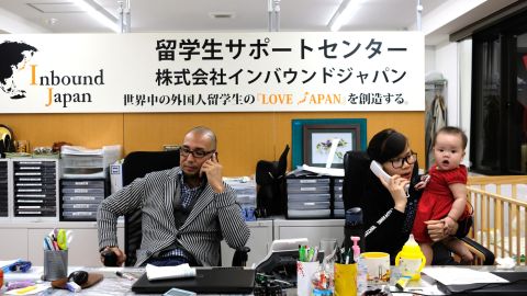Yusuke Furumi at work in the Inbound Japan office with his Vietnamese colleague, Angel Phan.