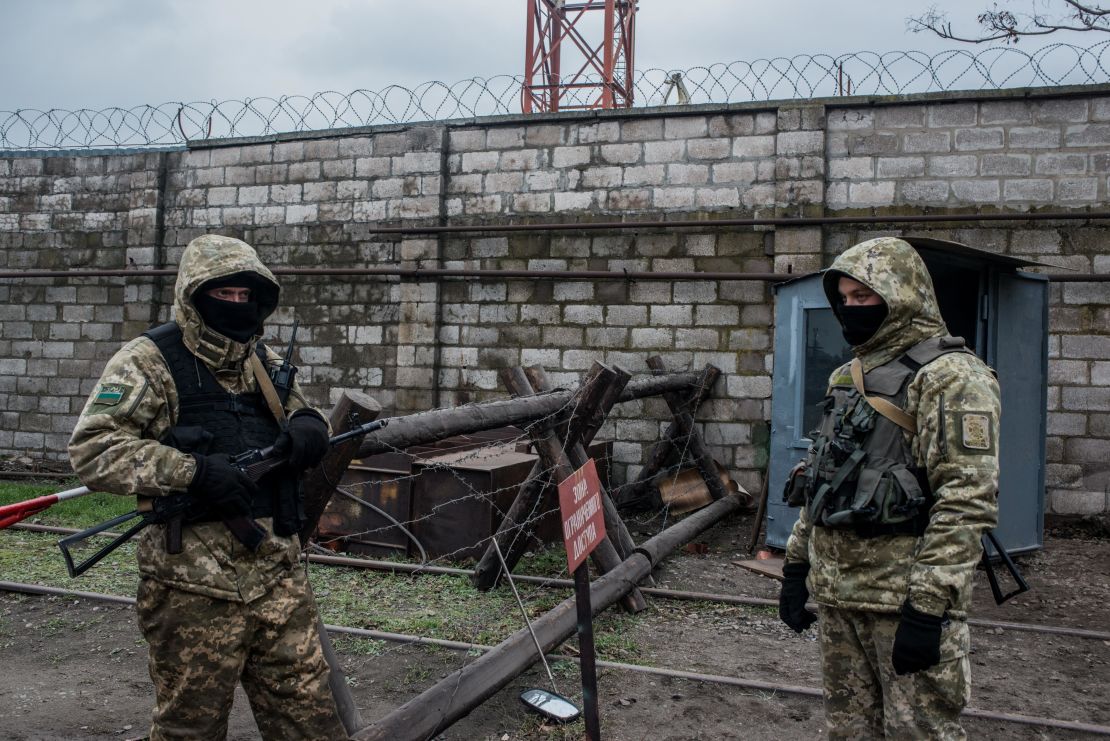 Ukrainian sea border security soldiers man a checkpoint at the Mariupol Port on Wednesday.
