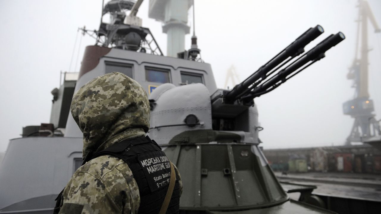 TOPSHOT - Ukrainian soldier patrols aboard military boat called "Dondass" moored in Mariupol, Sea of Azov port on November 27, 2018. - Three Ukrainian navy vessels were seized off the coast of Crimea by Russian forces, which fired on and boarded Kiev's ships after several tense hours of confrontation. Here's what is known about Sunday's incident. (Photo by Sega VOLSKII / AFP)        (Photo credit should read SEGA VOLSKII/AFP/Getty Images)