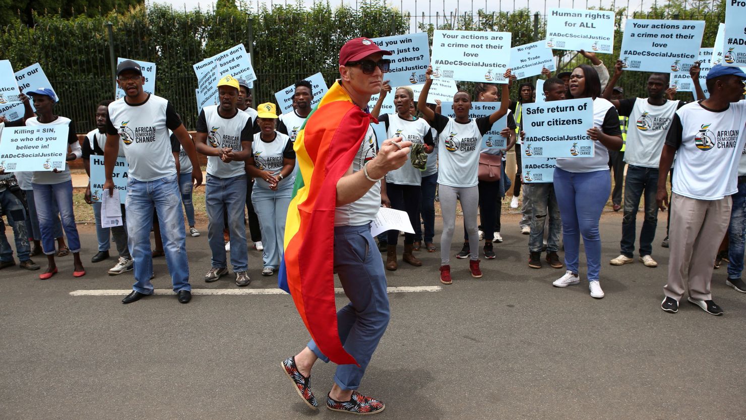 South African Members of the Lesbian, Gay, Bisexual, Transgender, Queer or Questioning and Intersex community (LGBTQI) protest outside the Tanzania High Commission on November 26, 2018 in Pretoria.