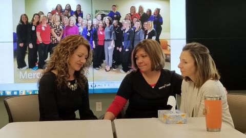 Stephanie Brinkman (middle) organized a lottery pool for the NICU staff at Mercy Children's Hospital in the St. Louis area. When the group won $10,000, they decided to give the cash to Gretchen Post (left), whose 17-year-old son died by suicide the night of the drawing, and to Casey Orellana (right), whose husband is battling cancer.