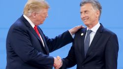 BUENOS AIRES, ARGENTINA - NOVEMBER 30: President of Argentina Mauricio Macri greets U.S. President Donald Trump  upon his arrival during the opening day of Argentina G20 Leaders' Summit 2018 at Costa Salguero on November 30, 2018 in Buenos Aires, Argentina. (Photo by Daniel Jayo/Getty Images)
