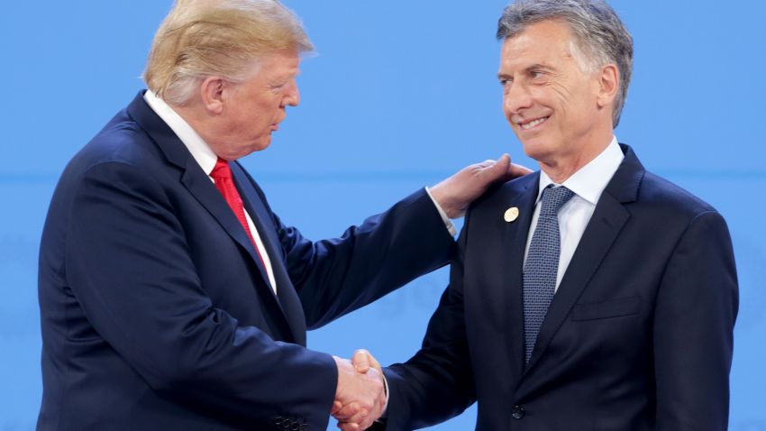 BUENOS AIRES, ARGENTINA - NOVEMBER 30: President of Argentina Mauricio Macri greets U.S. President Donald Trump upon his arrival during the opening day of Argentina G20 Leaders' Summit 2018 at Costa Salguero on November 30, 2018 in Buenos Aires, Argentina. (Photo by Daniel Jayo/Getty Images)