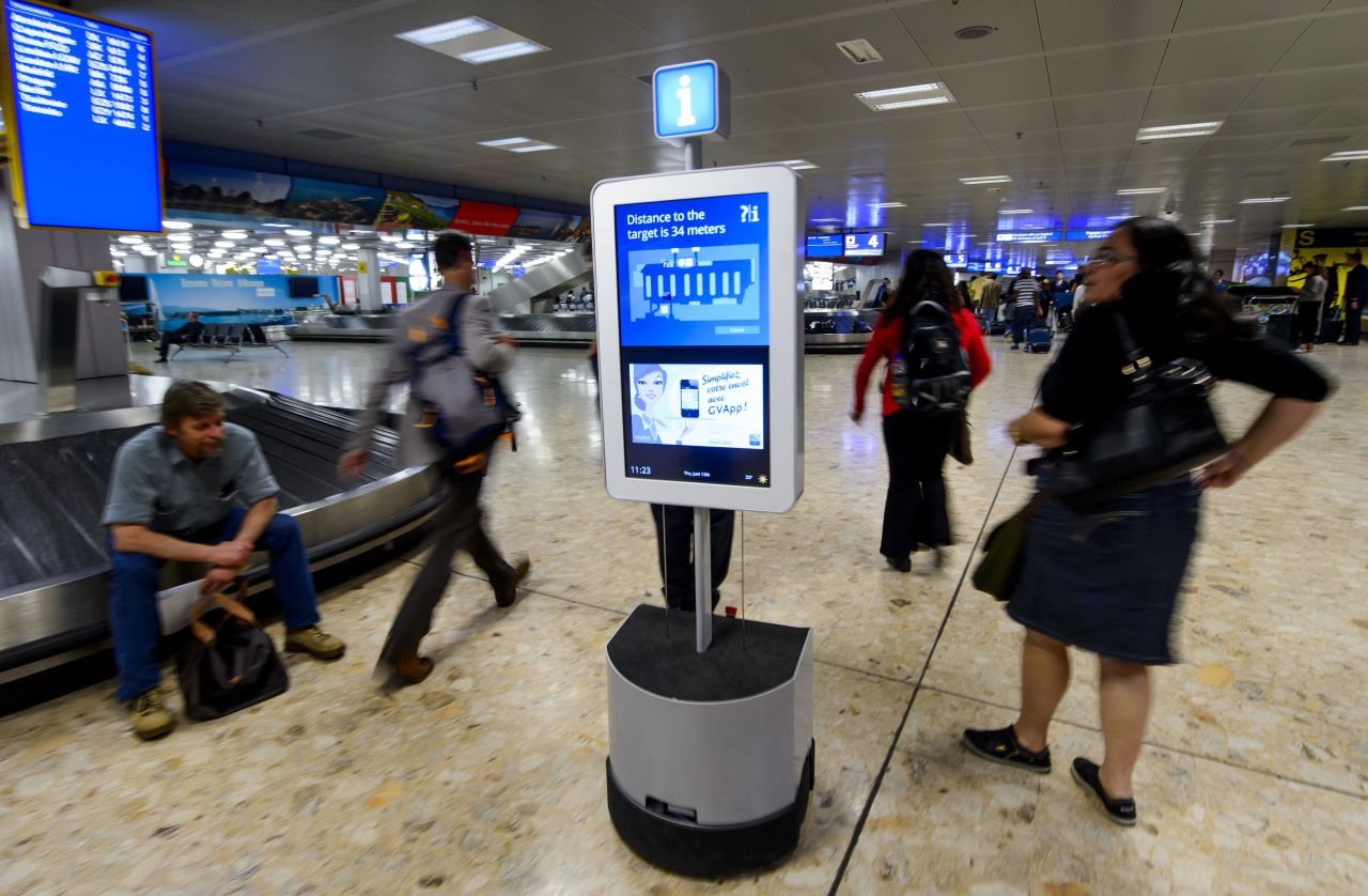 This robot tested at Geneva Airport  in 2013 guides passengers to trolleys, ATMs, the lost luggage room, and the bathrooms.