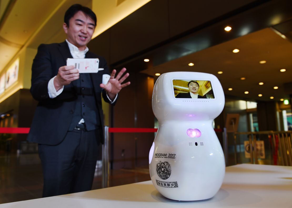 A humanoid unveiled as part of the Haneda Airport robot experiment project.
