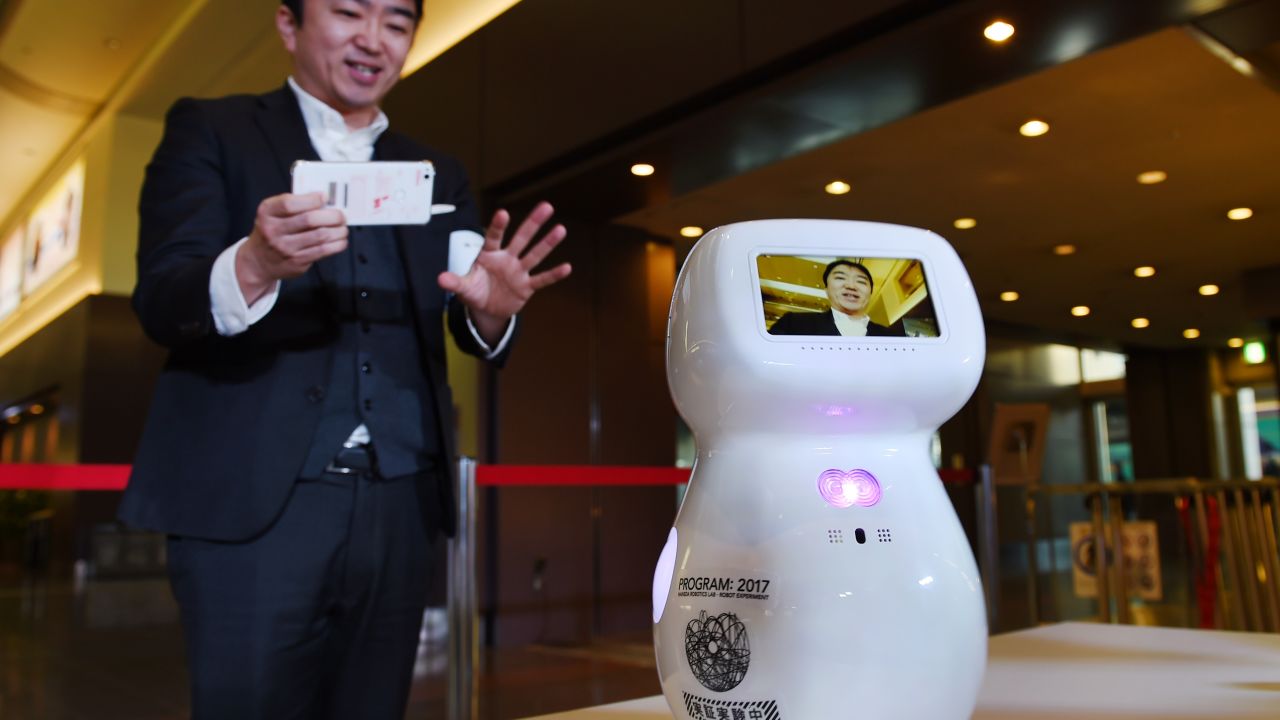 A humanoid unveiled as part of the Haneda Airport robot experiment project.