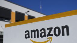 08 November 2018, North Rhine-Westphalia, Dortmund: The Amazon logo can be seen at the logistics centre. In Europe's first redistribution centre automated with conveyor technology, goods are received and distributed to other logistics centres of the Group in Europe. Photo by: Ina Fassbender/picture-alliance/dpa/AP Images