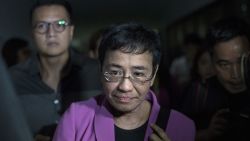 CEO of Philippine news website Rappler, Maria Ressa (C), arrives at the National Bureau of Investigation (NBI) headquarters in Manila on January 22, 2018.
The head of a news website threatened with closure by the government appeared before state investigators on January 22 over a defamation complaint which she decried as part of President Rodrigo Duterte's concerted attack on press freedom. / AFP PHOTO / NOEL CELIS        (Photo credit should read NOEL CELIS/AFP/Getty Images)