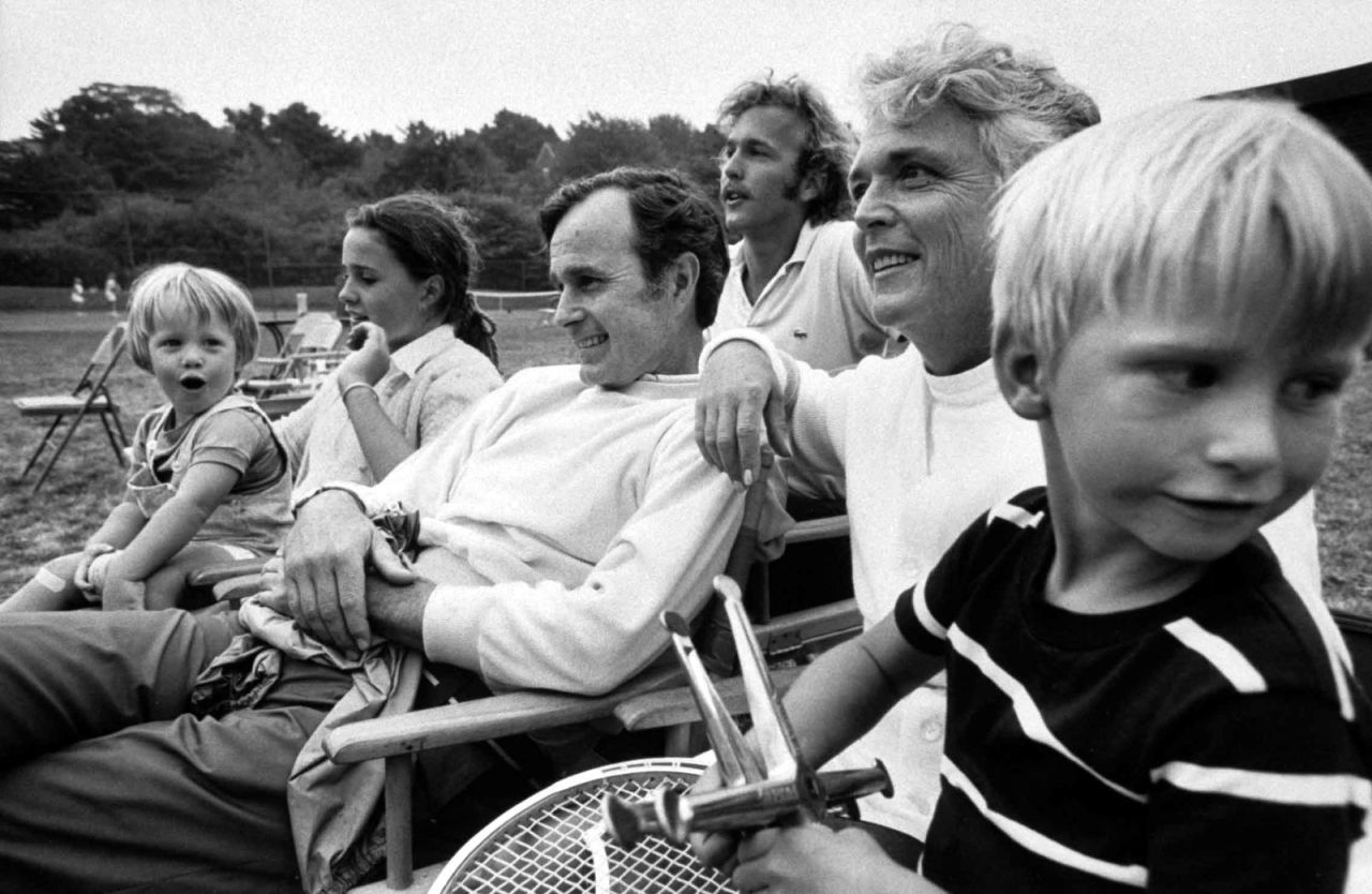 Bush sits with members of his family in 1971. He met his wife at a country club dance in 1941, and they were married in 1945. They had six children.