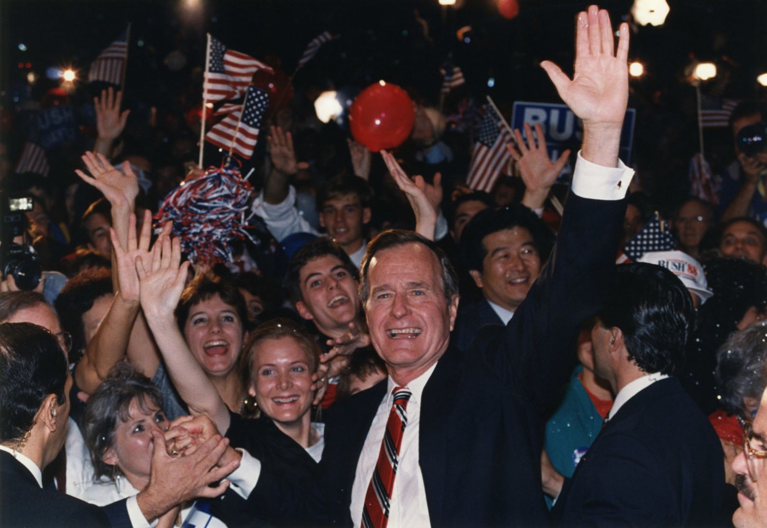Bush joins supporters in Houston after learning he had defeated Dukakis in the presidential election.