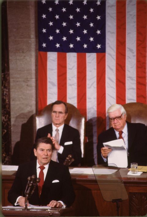 Bush and House Speaker Tip O'Neill listen to Reagan deliver his second State of the Union address in 1983.