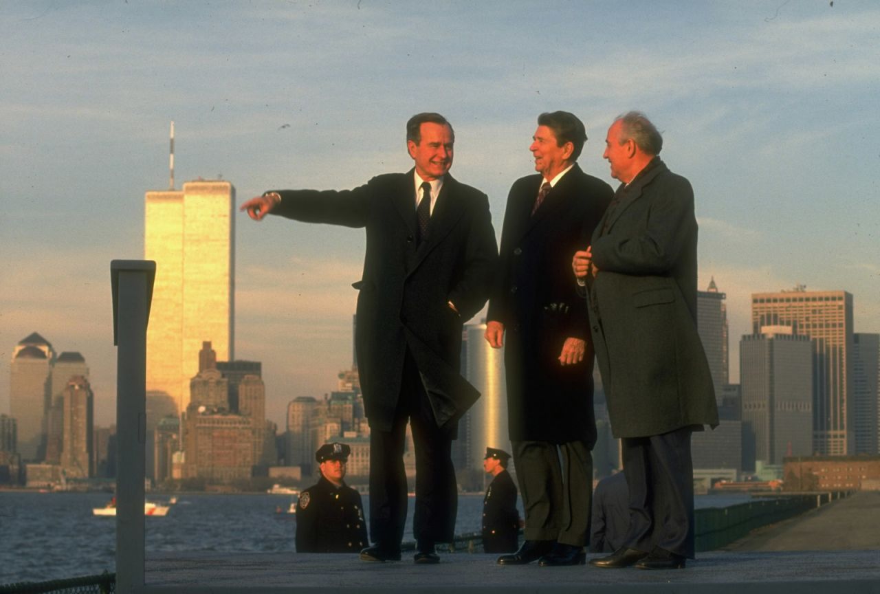 Soviet leader Mikhail Gorbachev takes in the New York skyline with Reagan and Bush in 1988.