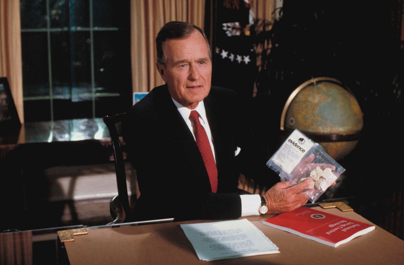 Bush holds up a plastic bag with crack cocaine during a televised speech about drugs in 1989. Weeks later it was revealed that government agents had bought the drugs from a dealer in front of the White House for the purpose of Bush's speech.