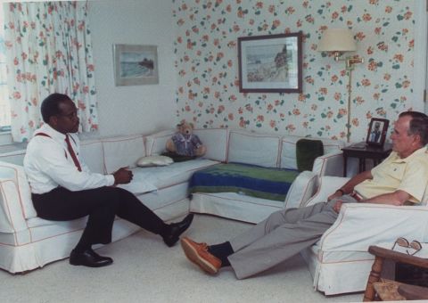 Bush, at his vacation home in Kennebunkport, meets with Supreme Court nominee Clarence Thomas in 1991. Bush also appointed Justice David Souter in 1990.