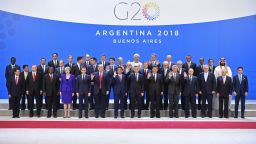 Participants of the G20 Leaders' Summit in Buenos Aires, pose for the family photo on November 30, 2018. - Global leaders gather in the Argentine capital for a two-day G20 summit likely to be dominated by simmering international tensions over trade. (Photo by Alexander NEMENOV / AFP)        (Photo credit should read ALEXANDER NEMENOV/AFP/Getty Images)