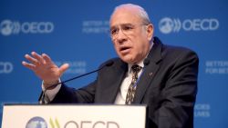 Secretary-General of the Organisation for Economic Co-operation and Development (OECD) Jose Angel Gurria gestures as he addresses a press conference to present the latest economic outlook at the OECD headquarters in Paris on November 21, 2018. (Photo by ERIC PIERMONT / AFP)        (Photo credit should read ERIC PIERMONT/AFP/Getty Images)