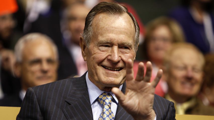 Former U.S. President George H.W. Bush acknowledges the audience on day two of the Republican National Convention (RNC) at the Xcel Energy Center in St. Paul, Minnesota, U.S., in this file photo dated September 2, 2008.