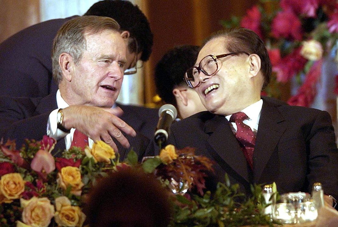 Former US President George Bush shares a laugh with then Chinese President Jiang Zemin in Houston, Texas, 23 October, 2002.