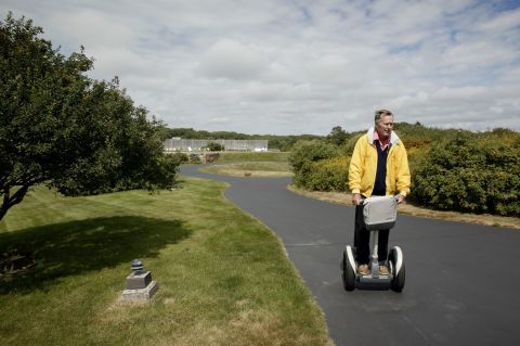 Bush rides a Segway at his home in Kennebunkport, Maine, in 2003.