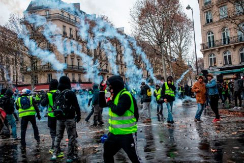 Protesters and police clash in downtown Paris on December 1 during a national demonstration.