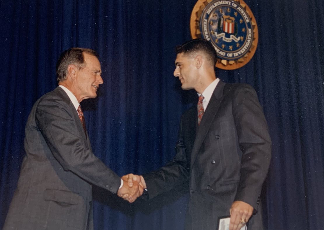 James Gagliano shakes hands with then-President George H.W. Bush at Gagliano's graduation from the FBI Academy.