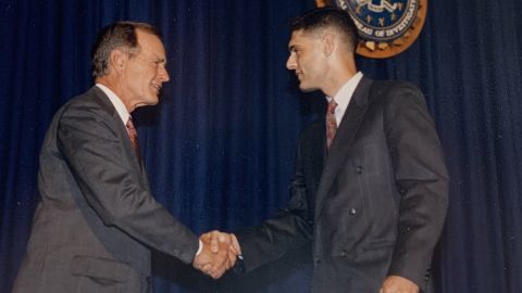 James Gagliano shakes hands with then-President George H.W. Bush at Gagliano's graduation from the FBI Academy.