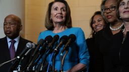 WASHINGTON, DC - NOVEMBER 28:  U.S. House Minority Leader Rep. Nancy Pelosi (D-CA) (2nd L) speaks to members of the media as (L-R) Rep. John Lewis (D-GA), Rep.-elect Veronica Escobar (D-TX), Rep. Joyce Beatty (D-OH), and Rep. Kathy Castor (D-FL) listen at the lobby of Longworth House Office Building November 28, 2018 in Washington, DC. House Democrats have nominated Rep. Nancy Pelosi to run for Speaker of the House for the 116th Congress. (Photo by Alex Wong/Getty Images)