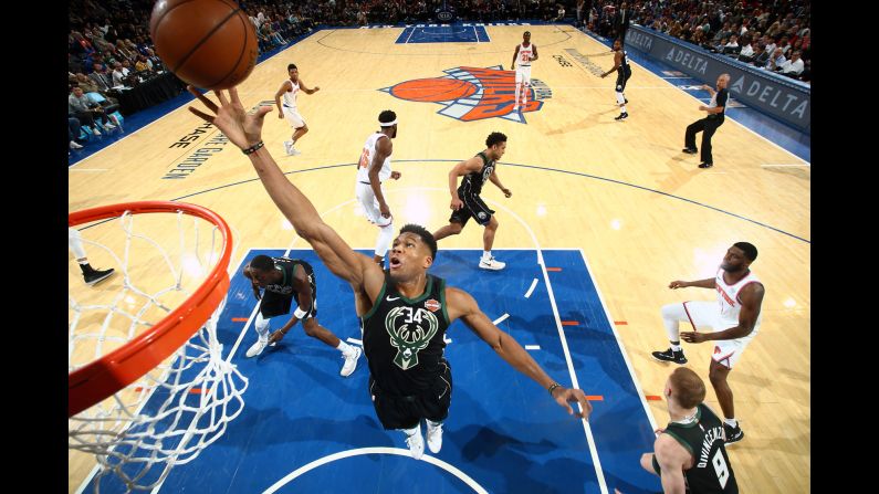 Giannis Antetokounmpo of the Milwaukee Bucks rebounds the ball against the New York Knicks on Saturday, December 1, at Madison Square Garden in New York.
