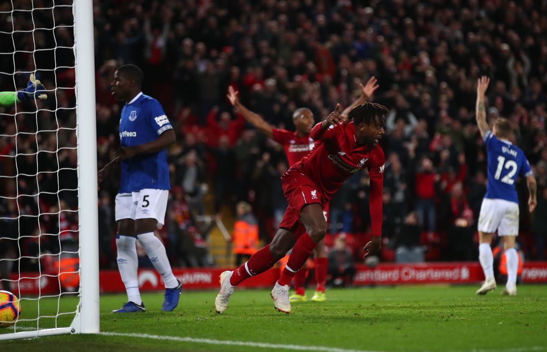 Liverpool's Divock Origi celebrates after scoring his team's only goal.