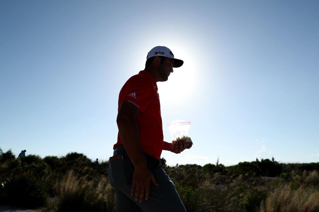 Rahm walks to the 15th fairway during the final round on Sunday.
